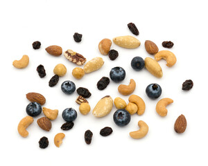 Nuts and berries on white background. Almond, Brazil, Macadamia, Cashew, Blueberries, Raisin