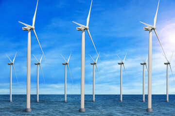 Floating wind turbines installed in sea under blue sky. Alternative energy source