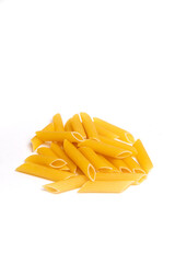 yellow pasta on white plate close up