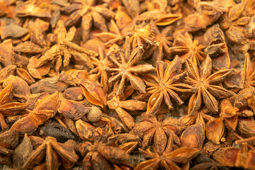 Star anise is the surface texture. Close up.