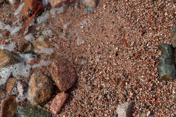 Red Sand and Stones of the red Sea Coast, Natural Texture Background