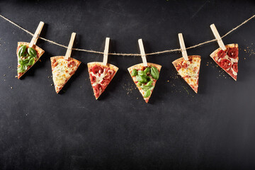 Portions of Italian pizzas with different toppings