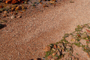 Red Sand and Stones of the red Sea Coast, Natural Texture Background
