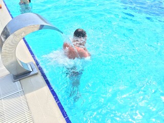 Swimming in the pool. Clear water