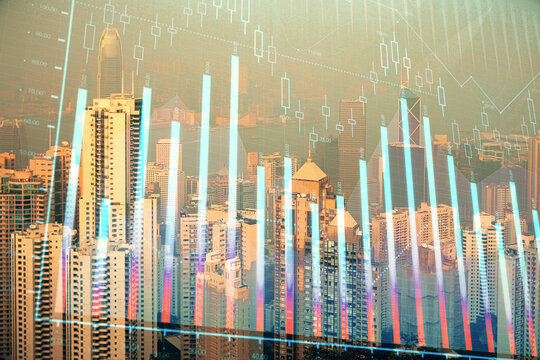 Forex chart on cityscape with skyscrapers wallpaper double exposure. Financial research concept. © peshkova