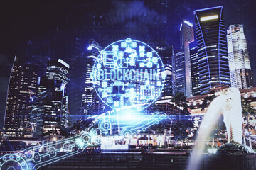 Multi exposure of cryptocurrency theme hologram drawing and city veiw background. Concept of blockchain and bitcoin.