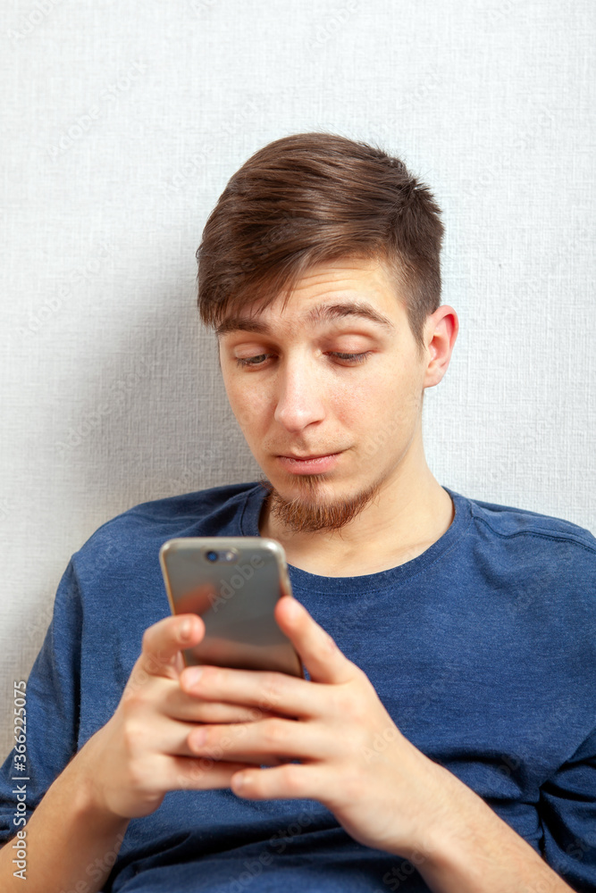 Canvas Prints young man with a phone