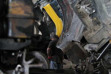 mechanic working on a lorry