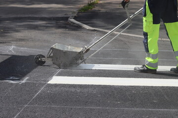 Thermoplastic road marking.  Pedestrian crossing implementation.