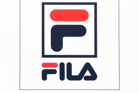 Villefranche, France - March 8, 2020: Fila logo on a wall. Fila is a sportswear manufacturer that designs shoes and apparel founded by Ettore and Giansevero Fila in 1911 