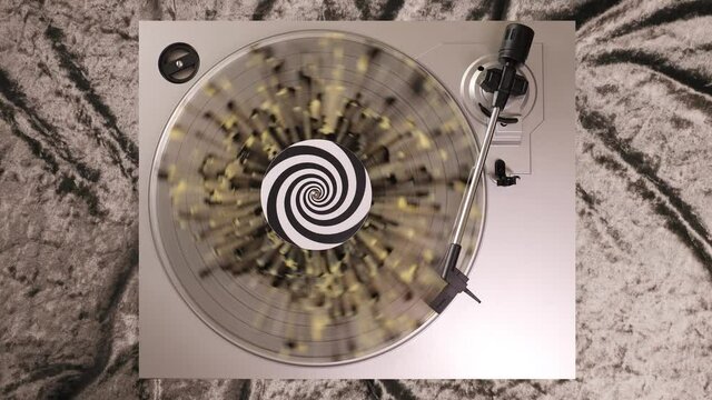 12 inch grey yellow and black splatter vinyl record on a DJ turntable with silver grey velvet background. Circular long player shot from above. Party, disco, punk, grunge, pop in 60s, 70s, 80s, 90s 4K