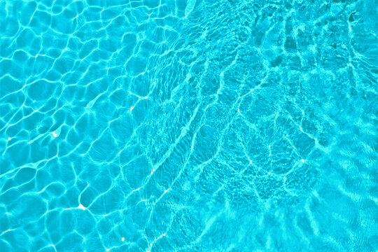 Swimming pool with clean water as background. Summer vacation