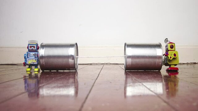 retro robots on a tin can phones 	