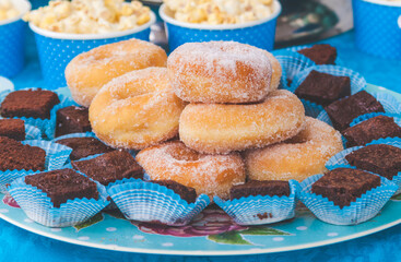 table full of sweets and donuts
