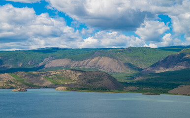 Lake Baikal, clear water, coastal cliffs, majestic hills, virgin forest, amazing sky