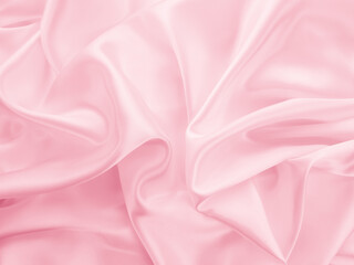 Beautiful elegant wavy light pink satin silk luxury cloth fabric texture, abstract background design. Copy space