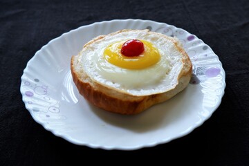 HOME MADE EGG BURGER TOP VIEW ,BLACK BACKGROUND