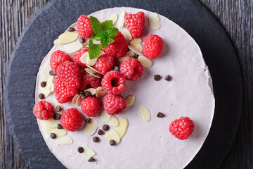 raspberry ice cream cake on a slate plate