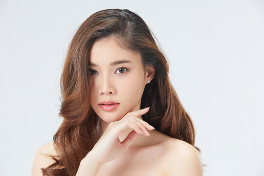 Beautiful Asian female model posing for beauty theme image isolated on white studio background