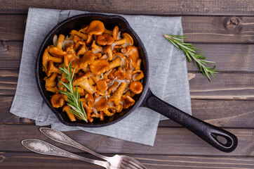 Fried chanterelle mushrooms with onions and rosemary