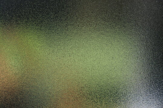fondo abstracto con vidrio granulado y transparencias de colores desenfocadas
