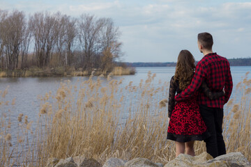 Romantic young couple in front of a lake in South Moravia, Czech Republic