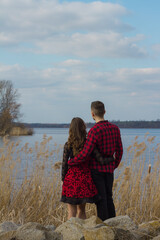 Romantic young couple in front of a lake in South Moravia, Czech Republic