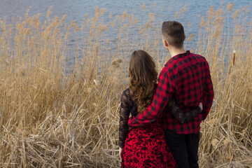 Romantic young couple in front of a lake in South Moravia, Czech Republic
