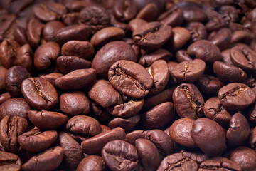 beautiful coffee beans scattered on the surface