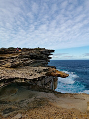 Beautiful and colorful rock formations along the sea cliff, Royal National Park, Sydney, New South Wales, Australia
