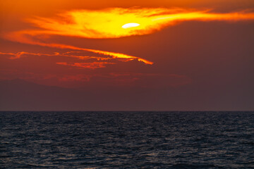 Dark dramatic sunset over the sea