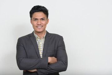 Portrait of handsome Asian businessman in suit