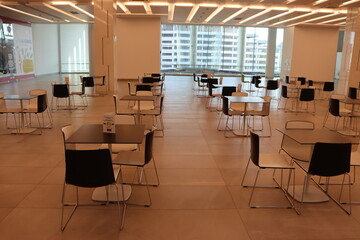 Fototapeta na wymiar business center canteen with tables and chairs