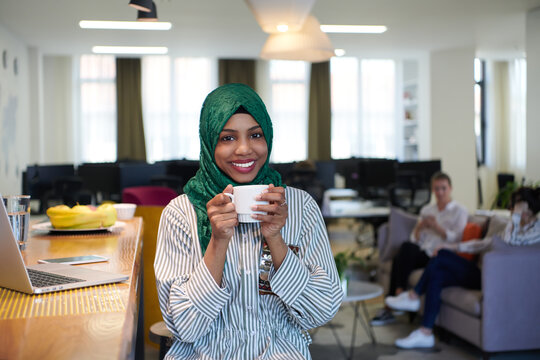 African Muslim Business Woman Drinking Tea