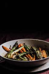 Vegetables sauteed in cream. sauteed in the pan, on the table ready to eat.