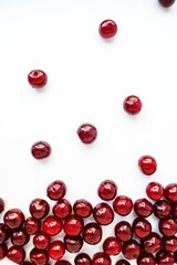 Red cherry ripe juicy on a white background.