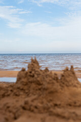 Sand castle by the water