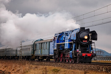 Fototapeta na wymiar old steam locomotive in operation with wagons