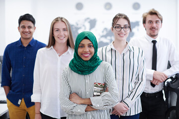 portrait of young excited multiethnics business team