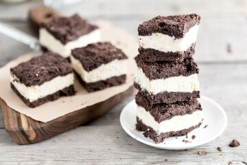 Royal cheesecake with with chocolate crumbs. homemade cottage cheese dessert with chocolate dough