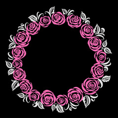 Floral round wreath with roses in pink and white colors.