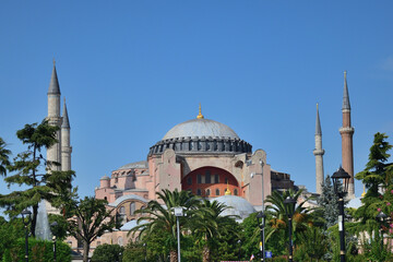 Fototapeta na wymiar Hagia Sophia (Aya Sophia), Christian greek-orthodox patriarchal basilica, imperial mosque and museum, Istanbul, Turkey - south side. The world famous monument of Byzantine architecture