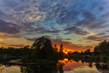 Obraz premium beautiful summer park and sunset