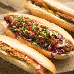 French bun sandwich with sausage and onion.