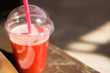 Lemonade in plastic cup. Handmade lemonade. Street food. Home business.