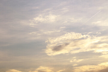 beautiful golden sunset with cumulus clouds