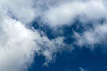Cumulus clouds in the blue sky during the day in Sunny weather