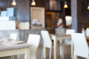 Abstract blur with bokeh. Beautiful luxury restaurant interior for background. 