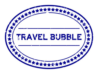 Grunge blue travel bubble word oval rubber seal stamp on white background