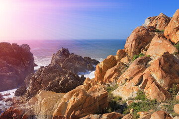 Fototapeta na wymiar rocky ocean coastline with sunshine